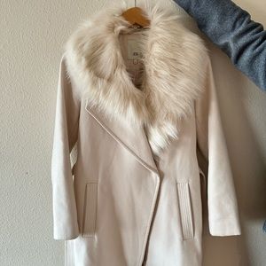 Cream color coat with detachable fur around neck